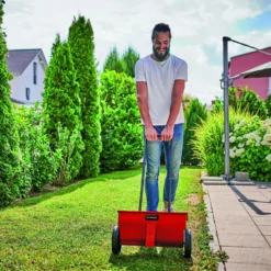 Einhell Strooiwagen GC-SR 12 (12 L - 45 Cm Strooibreedte - Dubbele Duwstang - Kliksluiting Aan Beide Zijden - Verstelhendel - Corrosiebestendige Rol - Behuizing Van Breukvast Kunststof) -Aanbiedingen Bloeiruimte Winkel 1200x949 2